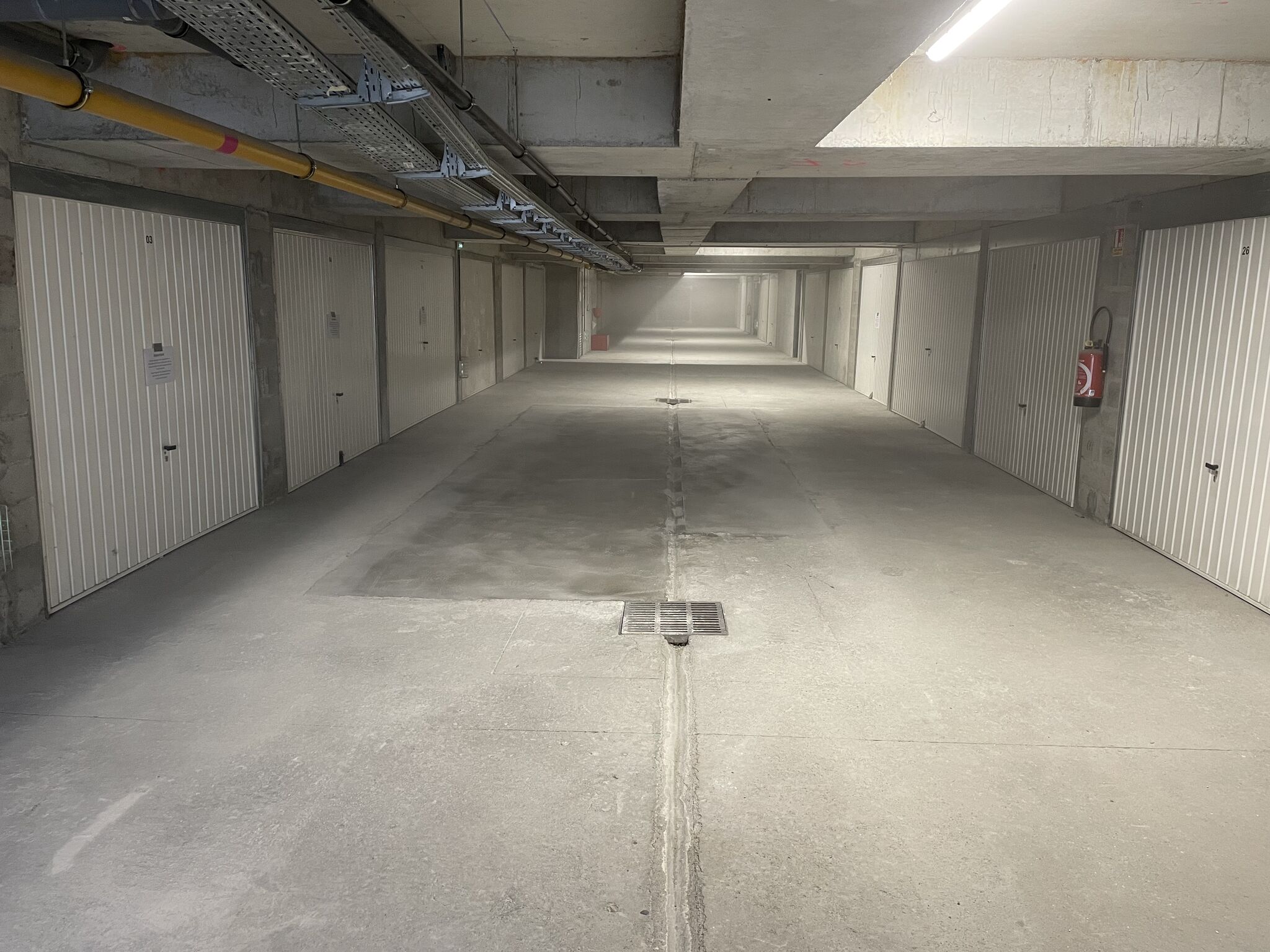 Réalisation de travaux de réfection d’un dallage pour une copropriété à Montluel (01) dans le cadre d’un dossier de dommage ouvrage-1